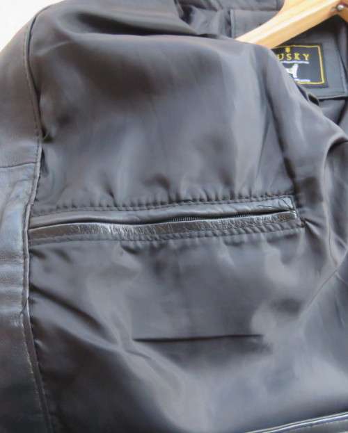 Genuine leather black Men`s jacket authentic original design.By HUSKY size 2XL.Pockets galore.As new