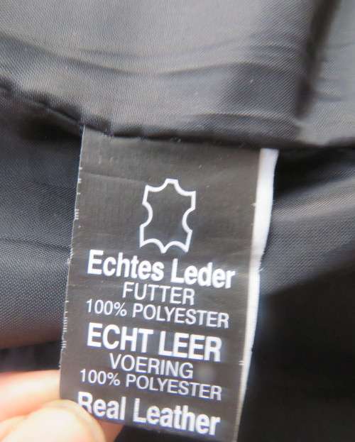 Genuine leather black Men`s jacket authentic original design.By HUSKY size 2XL.Pockets galore.As new