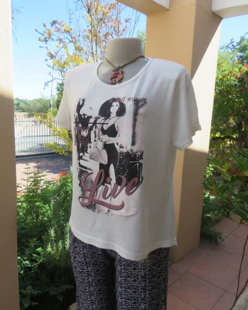 White short sleeve T Shirt by ATMOSPHERE size 38/14 in poly/viscose stretch.Logo BE WHAT YOU DARE.