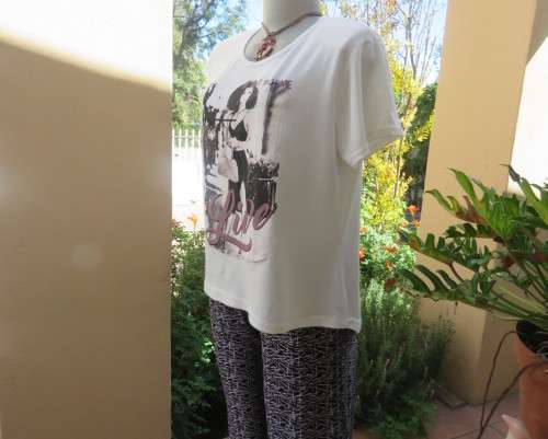 White short sleeve T Shirt by ATMOSPHERE size 38/14 in poly/viscose stretch.Logo BE WHAT YOU DARE.