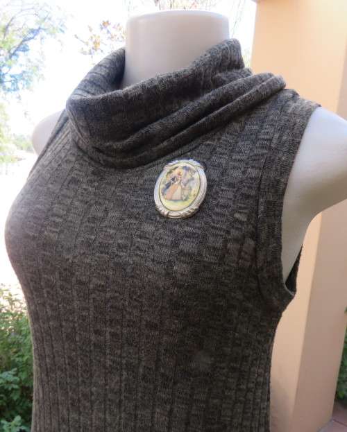 Fabulous olive green poloneck long knitted top in viscose/poly stretch.Size 34 to 36.By COTTON ON.