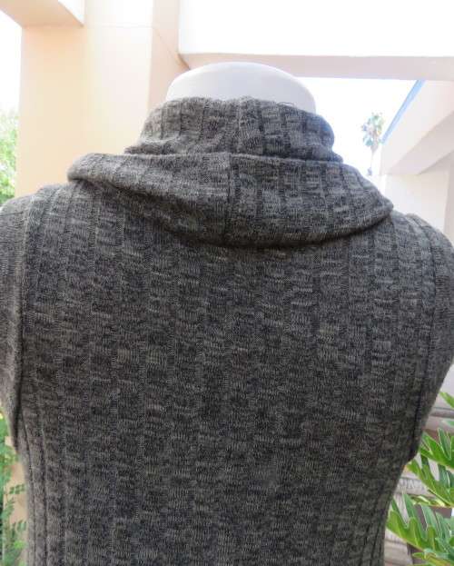 Fabulous olive green poloneck long knitted top in viscose/poly stretch.Size 34 to 36.By COTTON ON.