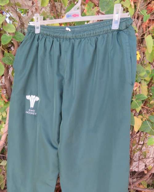 SWD HOCKEY pants lined in dark green with elasticated waist and drawstring.Size MEDIUM.As new.
