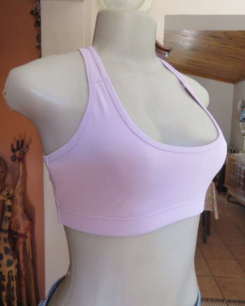 Soft lilac sports bra size 32 by MAXED in stretch polyester fabric. As new