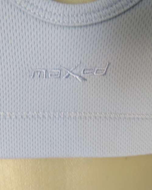 As new light blue size 32 sports bra by MAXED in stretch polyester.