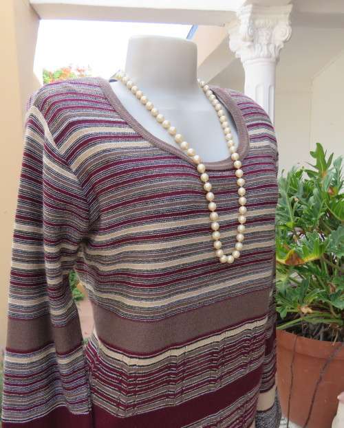 Smart long knitted pullover top in maroon,brown,cream and gold thread acrylic/polyester.Size 38/14.
