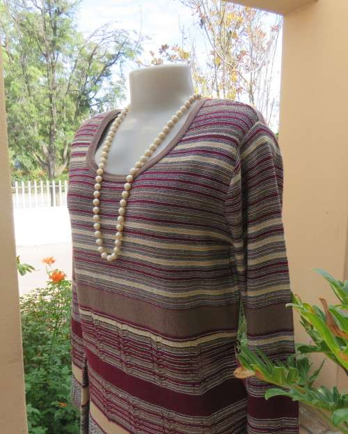 Smart long knitted pullover top in maroon,brown,cream and gold thread acrylic/polyester.Size 38/14.