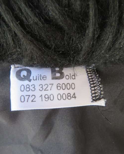 Black faux fur hip length jacket with open rounded collar.Close with long button and loop.Size 38/40