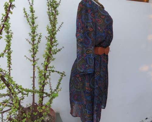 Marvelous sheer polyester lined slip over dress in blues,peach and gold paisley pattern.Size 38/14