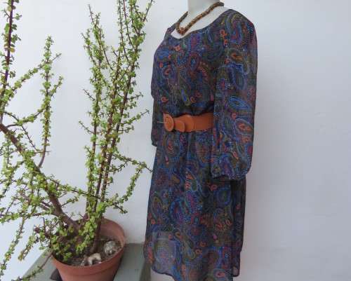 Marvelous sheer polyester lined slip over dress in blues,peach and gold paisley pattern.Size 38/14