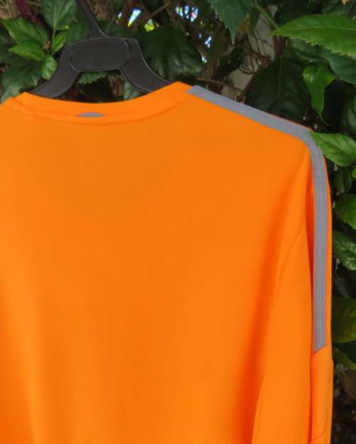 Striking original ADIDAS running slip over long sleeve top in orange polyester size XL.As new