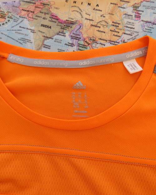 Striking original ADIDAS running slip over long sleeve top in orange polyester size XL.As new