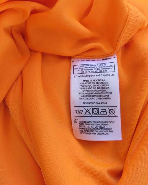 Striking original ADIDAS running slip over long sleeve top in orange polyester size XL.As new