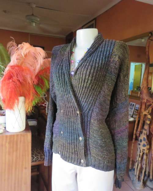 Warm acrylic knit dark jewel colour long sleeve cardigan.Double breast. Size 42 to 44.Very good cond