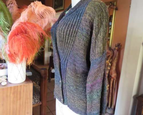 Warm acrylic knit dark jewel colour long sleeve cardigan.Double breast. Size 42 to 44.Very good cond