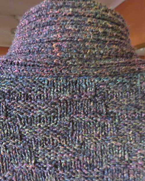 Warm acrylic knit dark jewel colour long sleeve cardigan.Double breast. Size 42 to 44.Very good cond