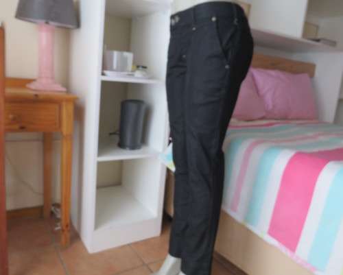 Sexy casual black low rise skinny leg stretch polycotton pants.By RT size 38/14.New condition.