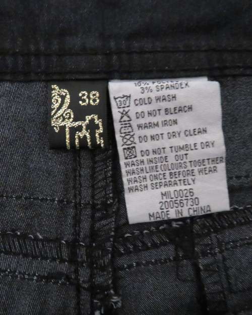 Sexy casual black low rise skinny leg stretch polycotton pants.By RT size 38/14.New condition.