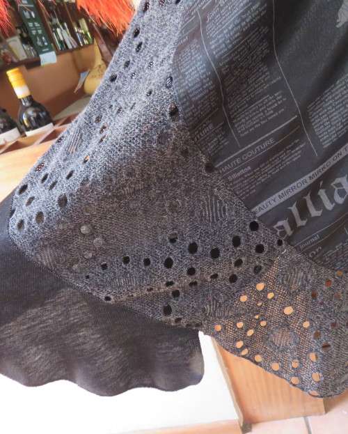 Sexy,shiny black long top with scooped neckline.Size 38/14.Circle panels in lace and poly.As new