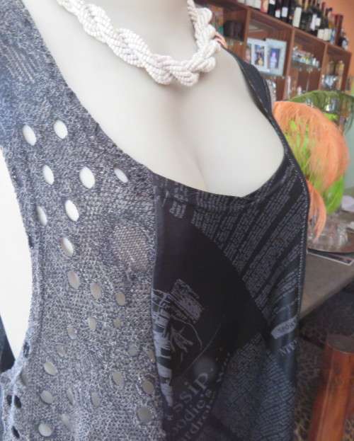 Sexy,shiny black long top with scooped neckline.Size 38/14.Circle panels in lace and poly.As new