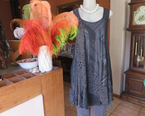 Sexy,shiny black long top with scooped neckline.Size 38/14.Circle panels in lace and poly.As new