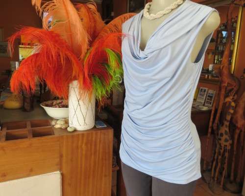 Stylish powder blue poly stretch top with soft flowing neckline and gathered sides by OASIS size 38