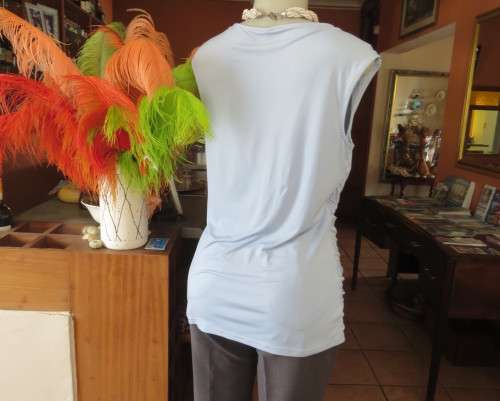 Stylish powder blue poly stretch top with soft flowing neckline and gathered sides by OASIS size 38