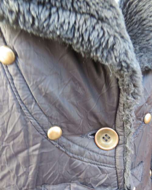 High fashion black long sleeve warm padded jacket size 32 to 34 by MATMAZELI. Faux fur collar/fronts