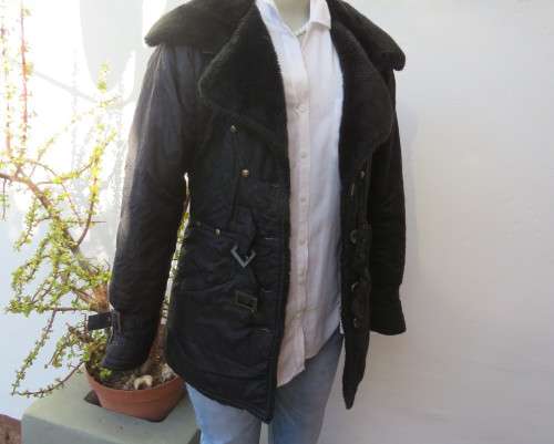 High fashion black long sleeve warm padded jacket size 32 to 34 by MATMAZELI. Faux fur collar/fronts