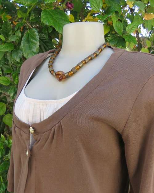 Casual med.brown slip over 100% cotton top with cream front inlay. Size 36/12. By WOOLWORTHS.