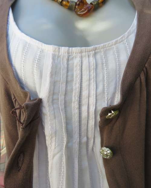 Casual med.brown slip over 100% cotton top with cream front inlay. Size 36/12. By WOOLWORTHS.