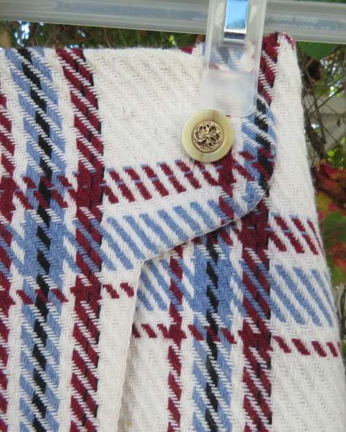 Stunning winters skort in cream tweed with blue/maroon check.Fold over with attached panties.Size 30