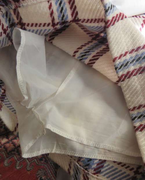 Stunning winters skort in cream tweed with blue/maroon check.Fold over with attached panties.Size 30