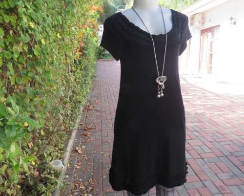 Irresistible black viscose stretch long top/short dress in 32/8 Capped sleeves.Frilled neck/hemline