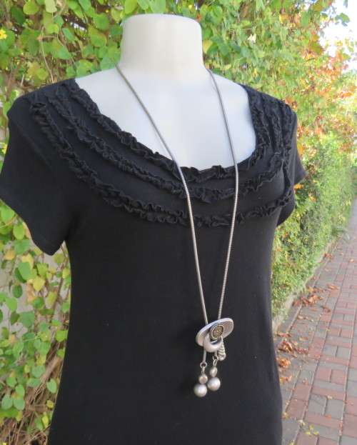 Irresistible black viscose stretch long top/short dress in 32/8 Capped sleeves.Frilled neck/hemline