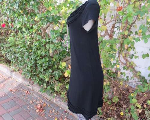 Irresistible black viscose stretch long top/short dress in 32/8 Capped sleeves.Frilled neck/hemline