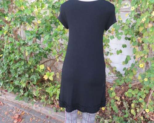 Irresistible black viscose stretch long top/short dress in 32/8 Capped sleeves.Frilled neck/hemline
