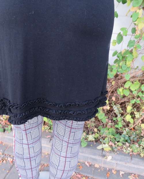 Irresistible black viscose stretch long top/short dress in 32/8 Capped sleeves.Frilled neck/hemline