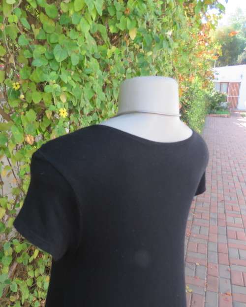 Irresistible black viscose stretch long top/short dress in 32/8 Capped sleeves.Frilled neck/hemline