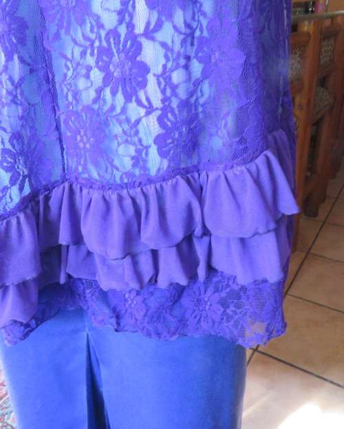 Girly purple acrylic lace gilet with netting front inlay. Frilled back seam.Size 36 to 38.As new