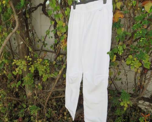 NIKE dri-fit white straight legged sport pants in 100% polyester with stretch netting inner,Size 36.