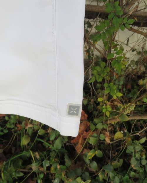 NIKE dri-fit white straight legged sport pants in 100% polyester with stretch netting inner,Size 36.