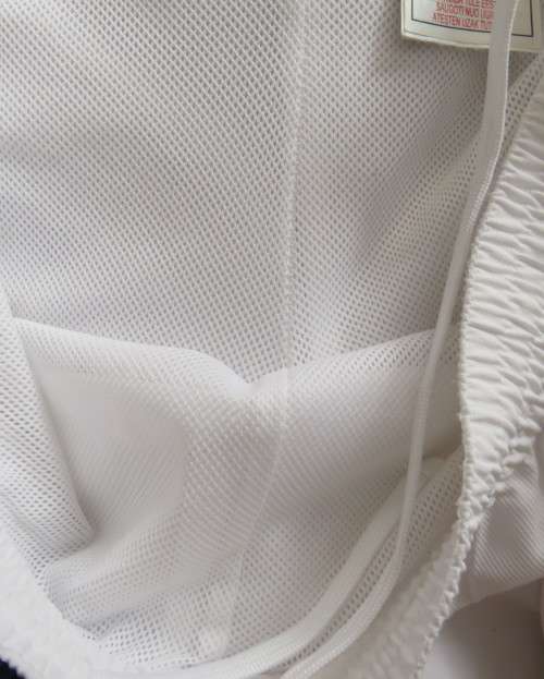 NIKE dri-fit white straight legged sport pants in 100% polyester with stretch netting inner,Size 36.