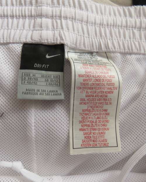 NIKE dri-fit white straight legged sport pants in 100% polyester with stretch netting inner,Size 36.