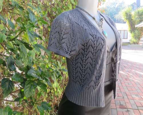 Sweet capped sleeve ash grey V front button down cover up/cardigan.Size 36 . As new.