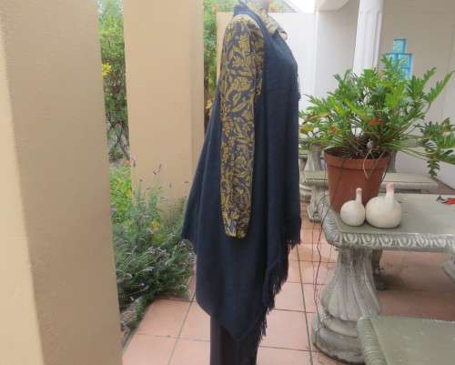 Handy extra long slate grey knitted 100% acrylic waterfall style gilet.Size 42 to 44.Fringed.As new