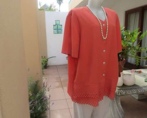 Make a statement in this button down burnt orange top/jacket by RHAPSODY size 44/20. New cond.