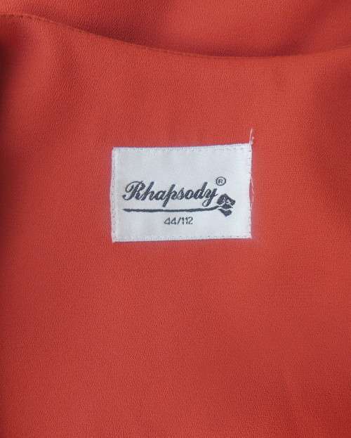 Make a statement in this button down burnt orange top/jacket by RHAPSODY size 44/20. New cond.