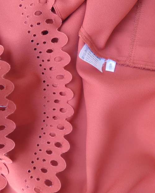 Make a statement in this button down burnt orange top/jacket by RHAPSODY size 44/20. New cond.