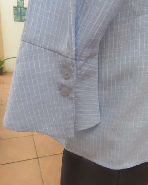 Beautiful slightly creased blue/white small check long sleeve button down top.Size 44/20.As new